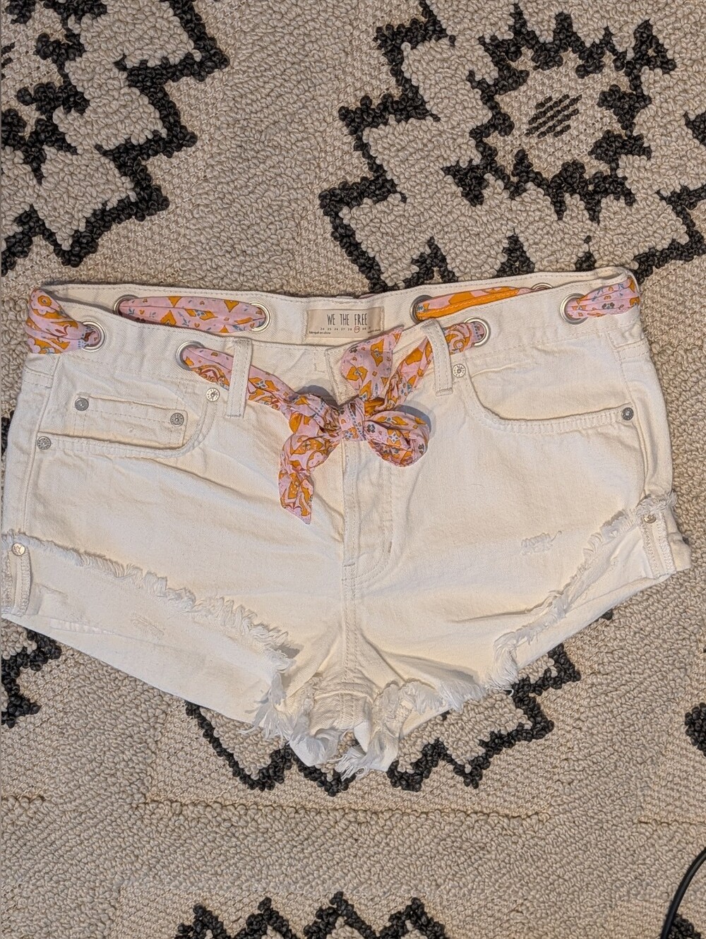 We The Free White Distressed Denim Cutoff Shorts with Pink & Orange Scarf Belt